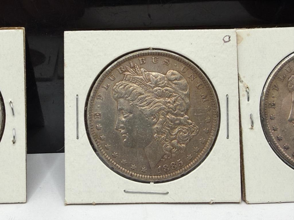 SEVEN U.S. MORGAN SILVER DOLLARS FEATURING VARIOUS DATES AND MINT MARKS - 6