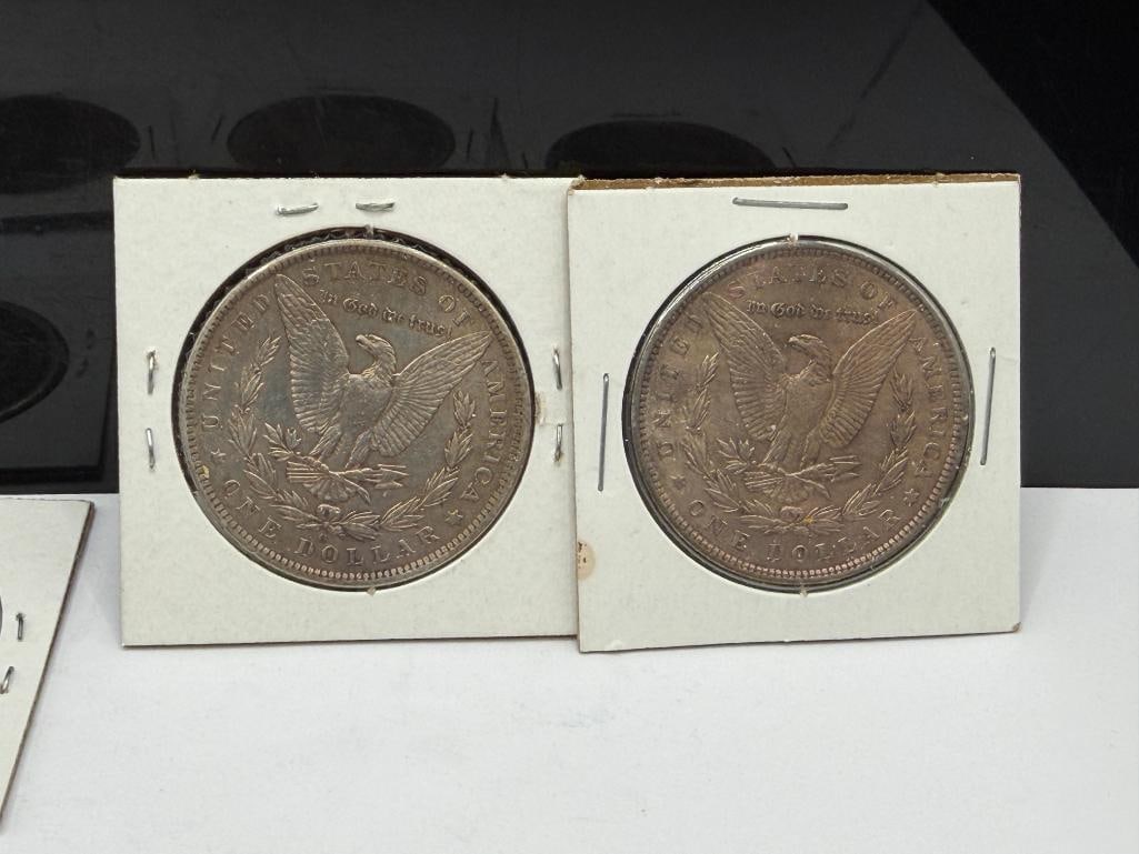 SEVEN U.S. MORGAN SILVER DOLLARS FEATURING VARIOUS DATES AND MINT MARKS - 7