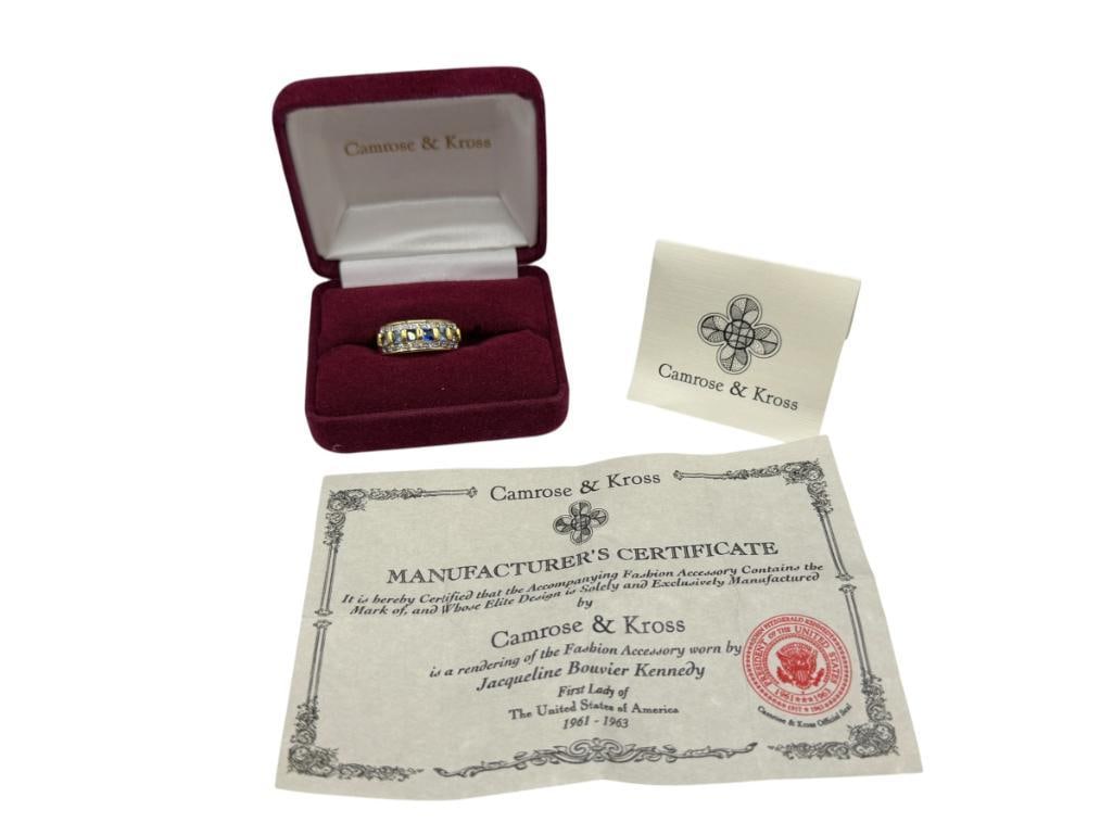 CAMROSE & KROSS DESIGNER SIGNED GOLD PLATED RING ACCENTED BY VIBRANT BLUE AND WHITE CRYSTALS: INCLUDES ORIGINAL BOX, CERTIFICATE, AND DESIGNER TAG SIZE 7, 5/16" FRONT, UP TO 3.5MM CRYSTALS