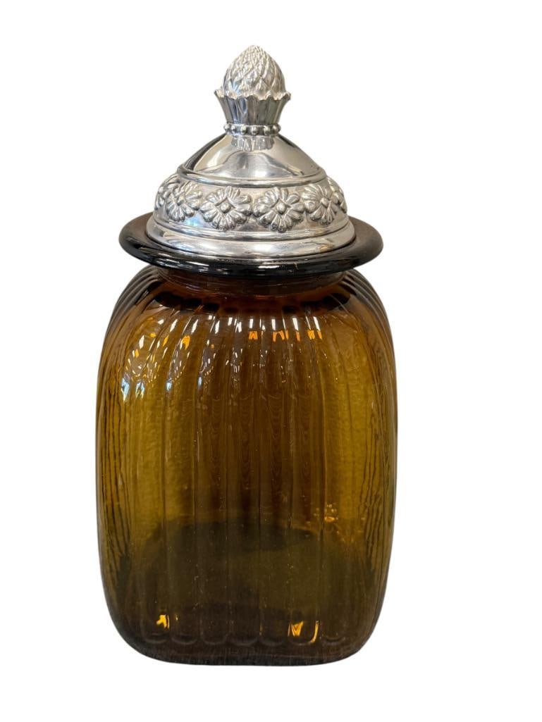 ARTLAND RIBBED AMBER CANISTER WITH DECORATIVE PINEAPPLE AND FLORAL PEWTER LID: MARKED ON THE UNDERSIDE OF THE LID, NO CRACKS OR CHIPS 12 3/4" H