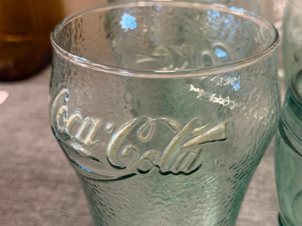 ASSORTMENT OF CLEAR AND AQUA COLORED GLASS COCA-COLA DRINKING GLASSES - 7