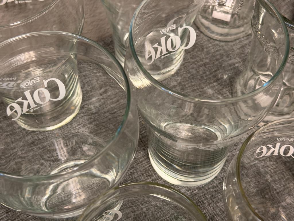 ASSORTMENT OF CLEAR AND AQUA COLORED GLASS COCA-COLA DRINKING GLASSES - 9