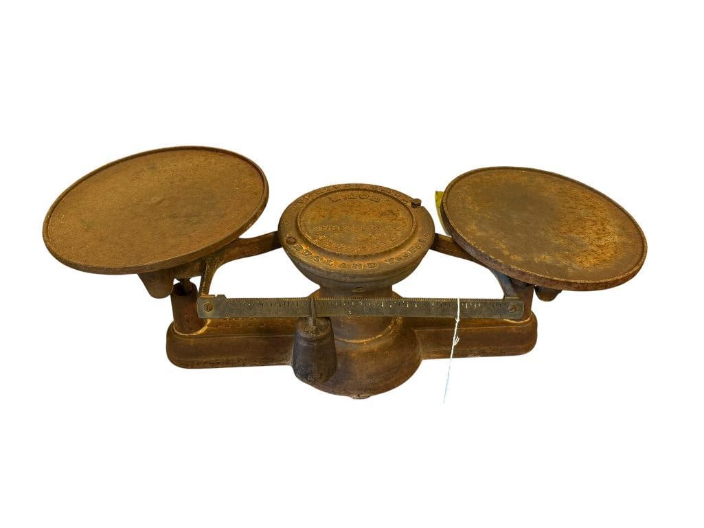 1800'S HOWE SCALE CO. INDUSTRIAL 2 LBS CAPACITY CAST IRON BALANCE SCALE NO. O: MADE IN RUTLAND, VT., VARIOUS PAT DATES EMBOSSED ON THE BASE AND TOP, LATEST PAT DATE 1867, OBVIOUS SURFACE RUST PRESENT, COMPLETE, FUNCTIONAL 24 1/2" L