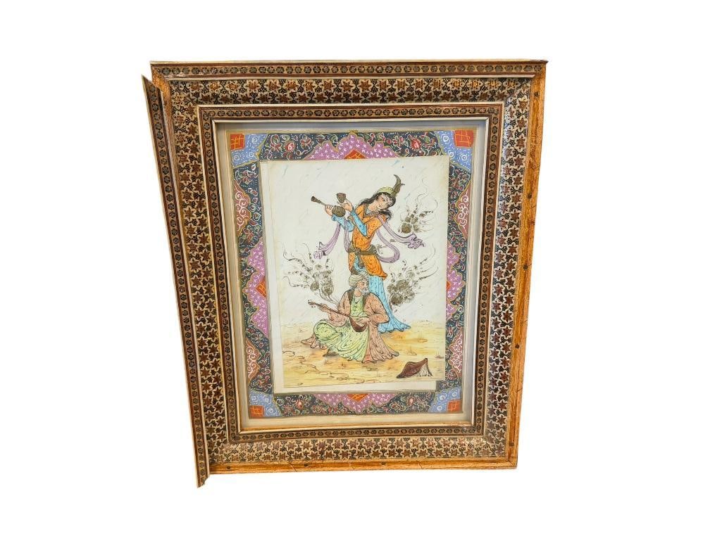 VINTAGE PERSIAN PAINTING ON BONE WITH SCENE OF A DANCER AND MUSICIAN IN INTRICATE INLAY FRAME: HAND PAINTED BORDER, FRAME NEEDS REPAIR, MISSING TWO INLAY PANELS 10 1/2" X 12 1/2" FRAME