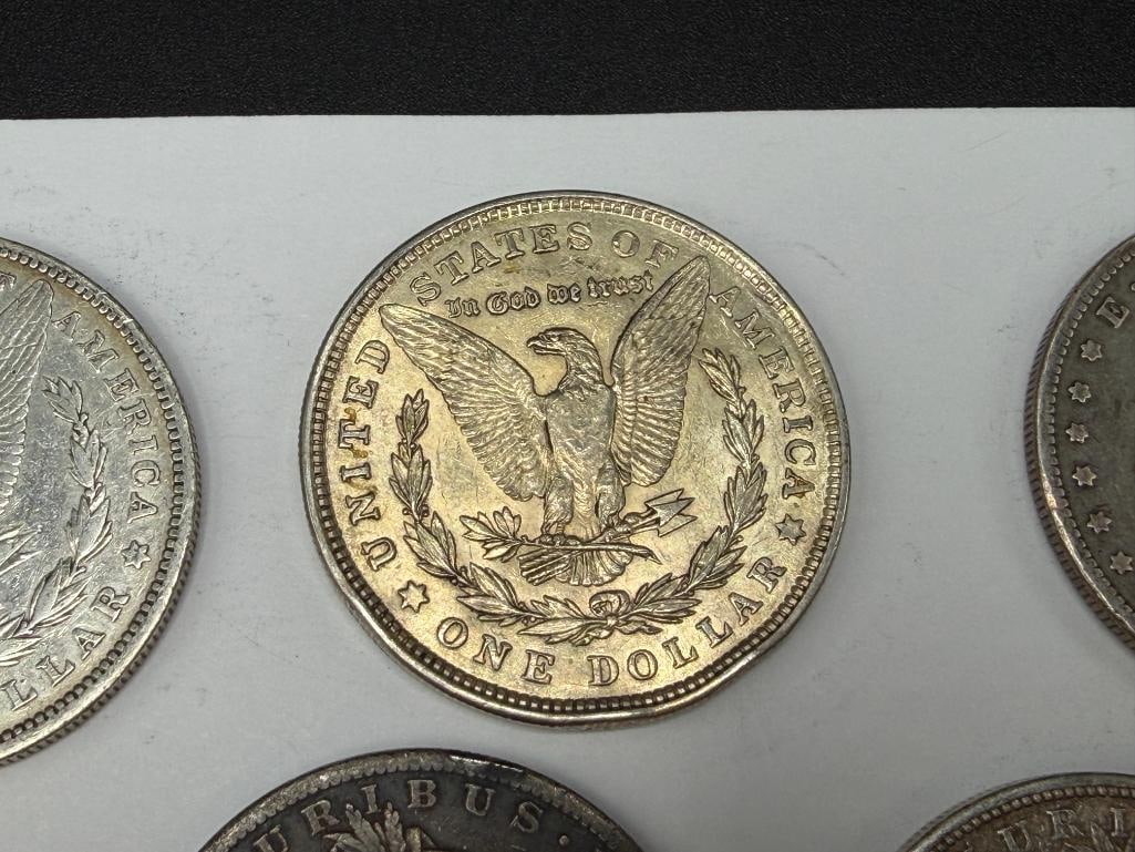 FIVE U.S. MORGAN SILVER DOLLARS - 5