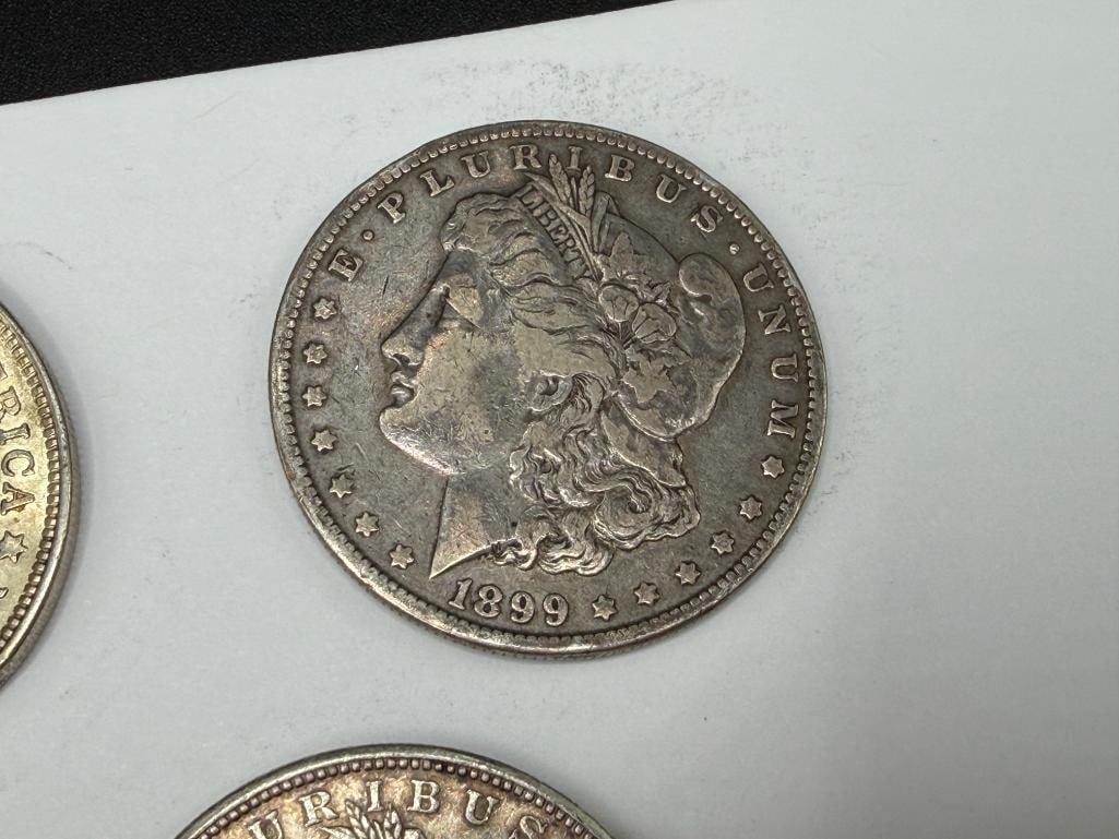 FIVE U.S. MORGAN SILVER DOLLARS - 6