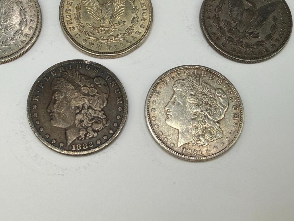 FIVE U.S. MORGAN SILVER DOLLARS - 8