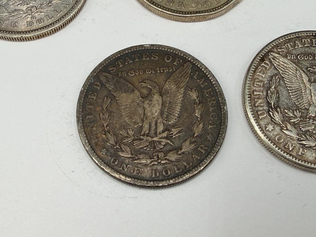 FIVE U.S. MORGAN SILVER DOLLARS - 9
