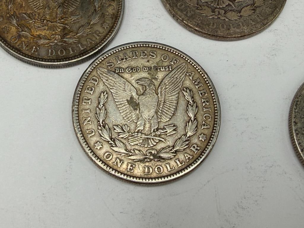 FIVE U.S. MORGAN SILVER DOLLARS - 12