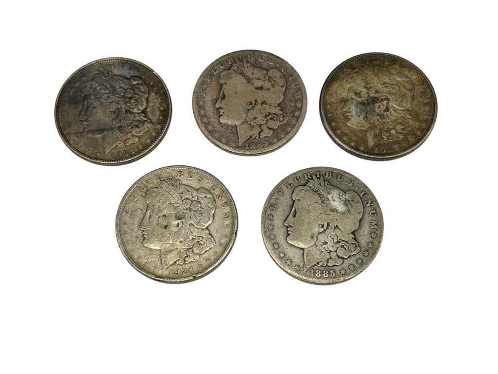 FIVE U.S. MORGAN SILVER DOLLARS