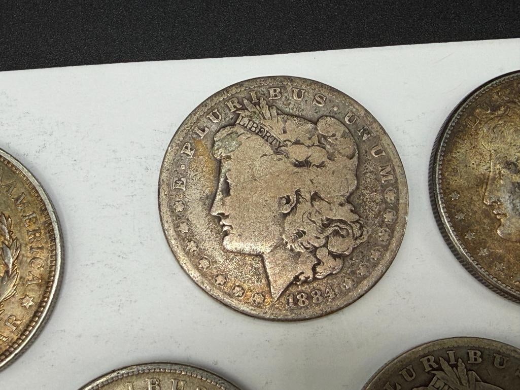 FIVE U.S. MORGAN SILVER DOLLARS - 5