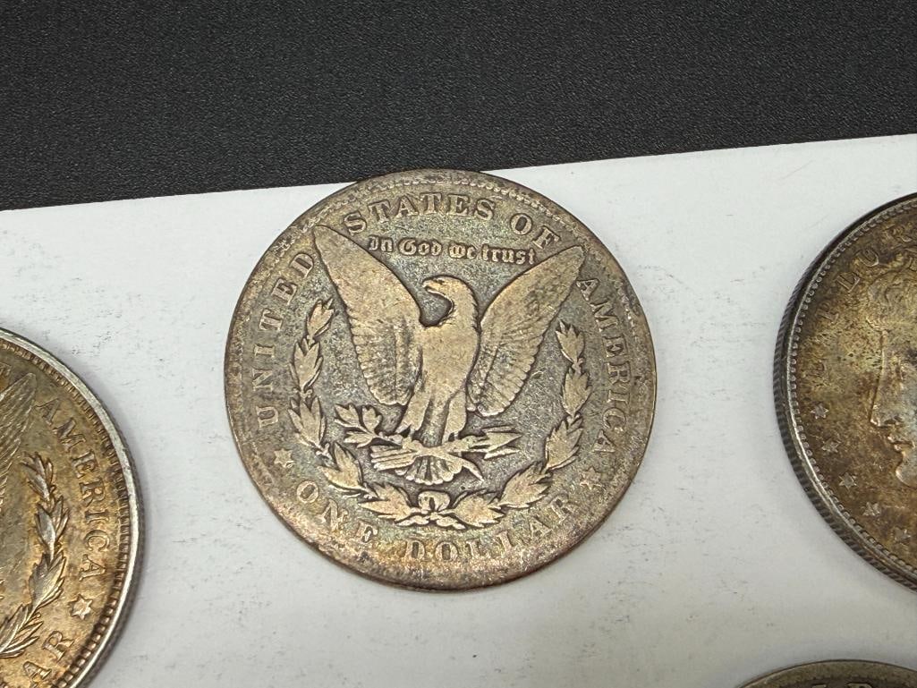 FIVE U.S. MORGAN SILVER DOLLARS - 6