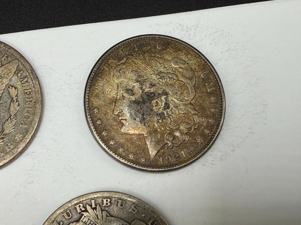 FIVE U.S. MORGAN SILVER DOLLARS - 7