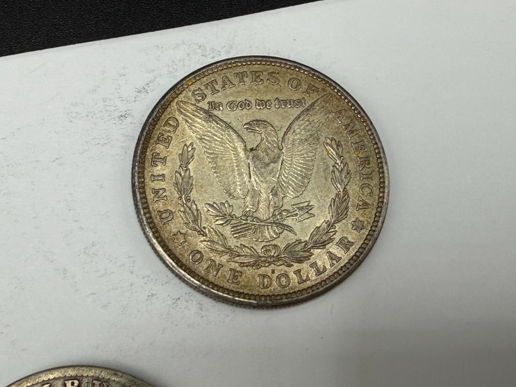 FIVE U.S. MORGAN SILVER DOLLARS - 8