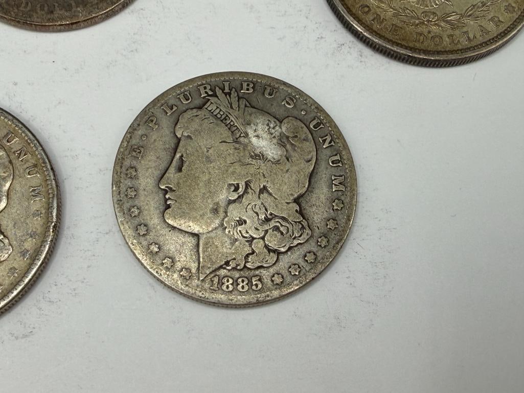 FIVE U.S. MORGAN SILVER DOLLARS - 9