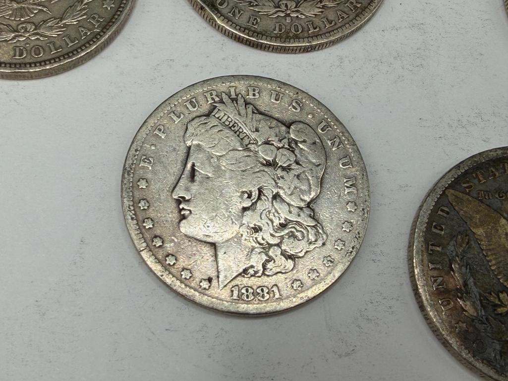 FIVE U.S. MORGAN SILVER DOLLARS - 10