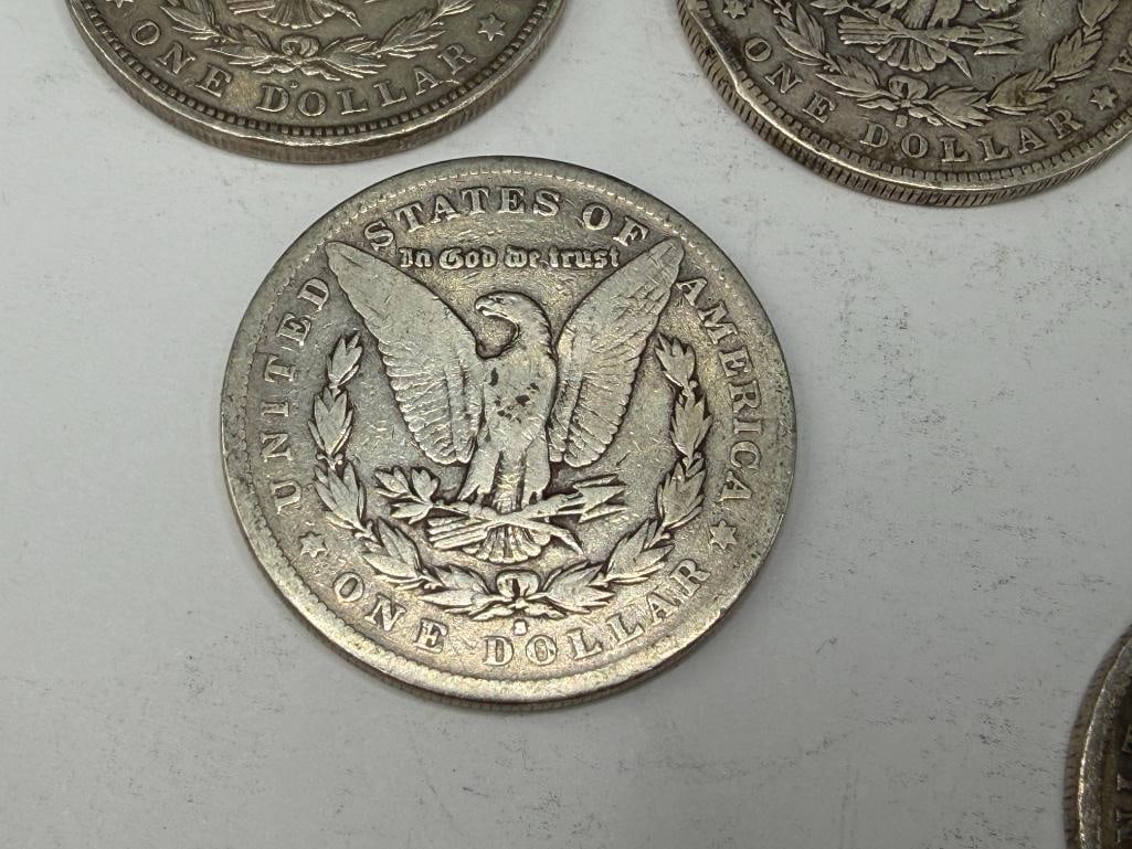 FIVE U.S. MORGAN SILVER DOLLARS - 11