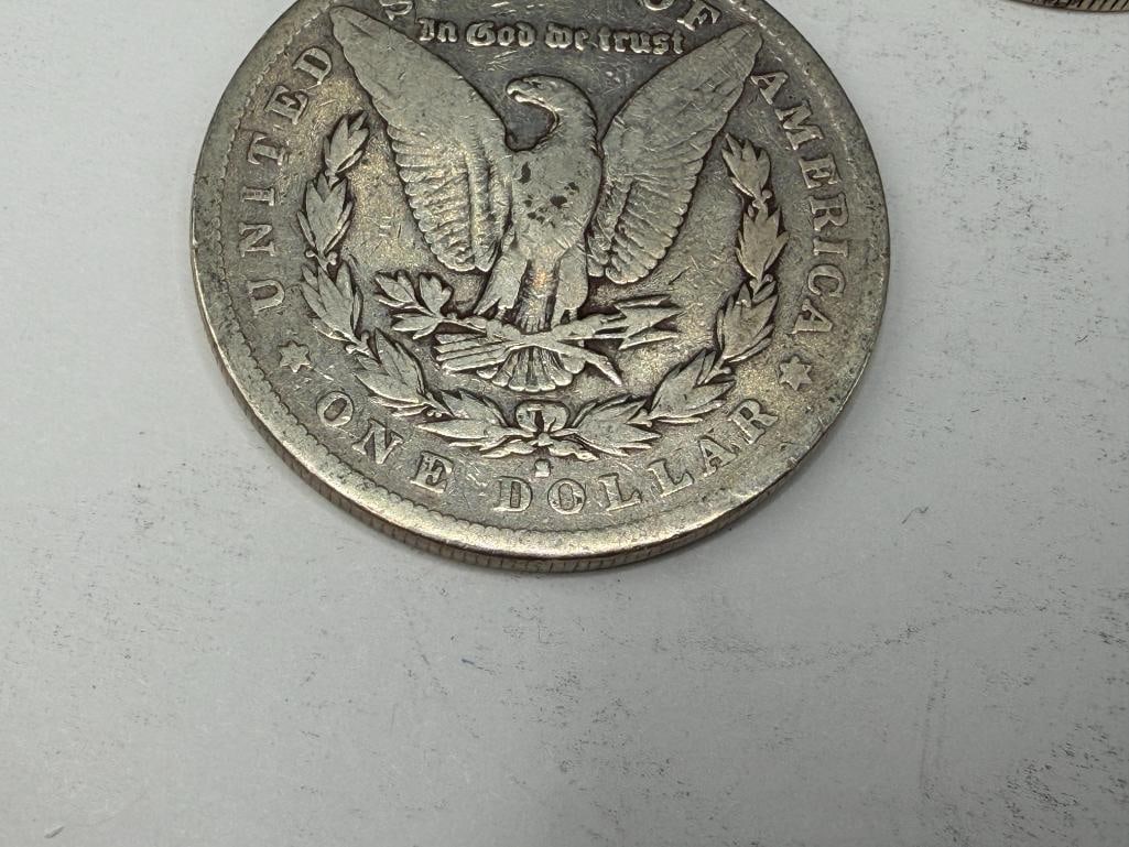 FIVE U.S. MORGAN SILVER DOLLARS - 12