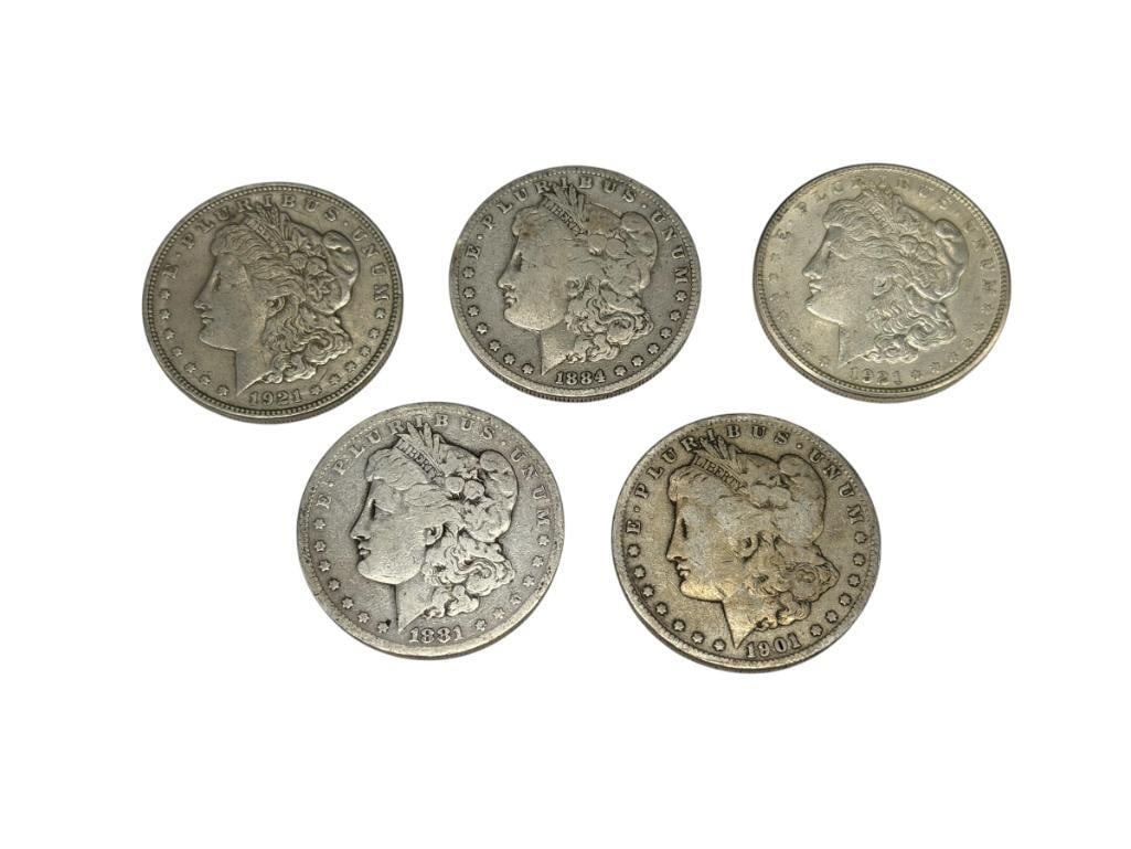 FIVE U.S. MORGAN SILVER DOLLARS: INCLUDING 1881-S, 1884-S, 1901-O, 1921-S, AND 1921-D, 90% SILVER