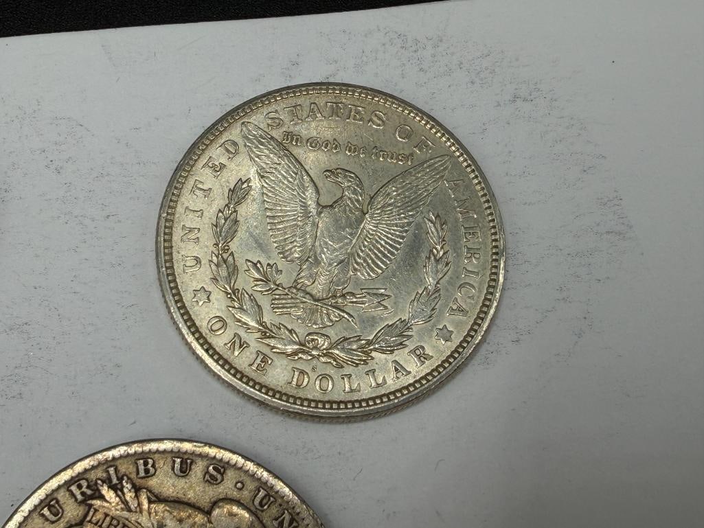 FIVE U.S. MORGAN SILVER DOLLARS - 7