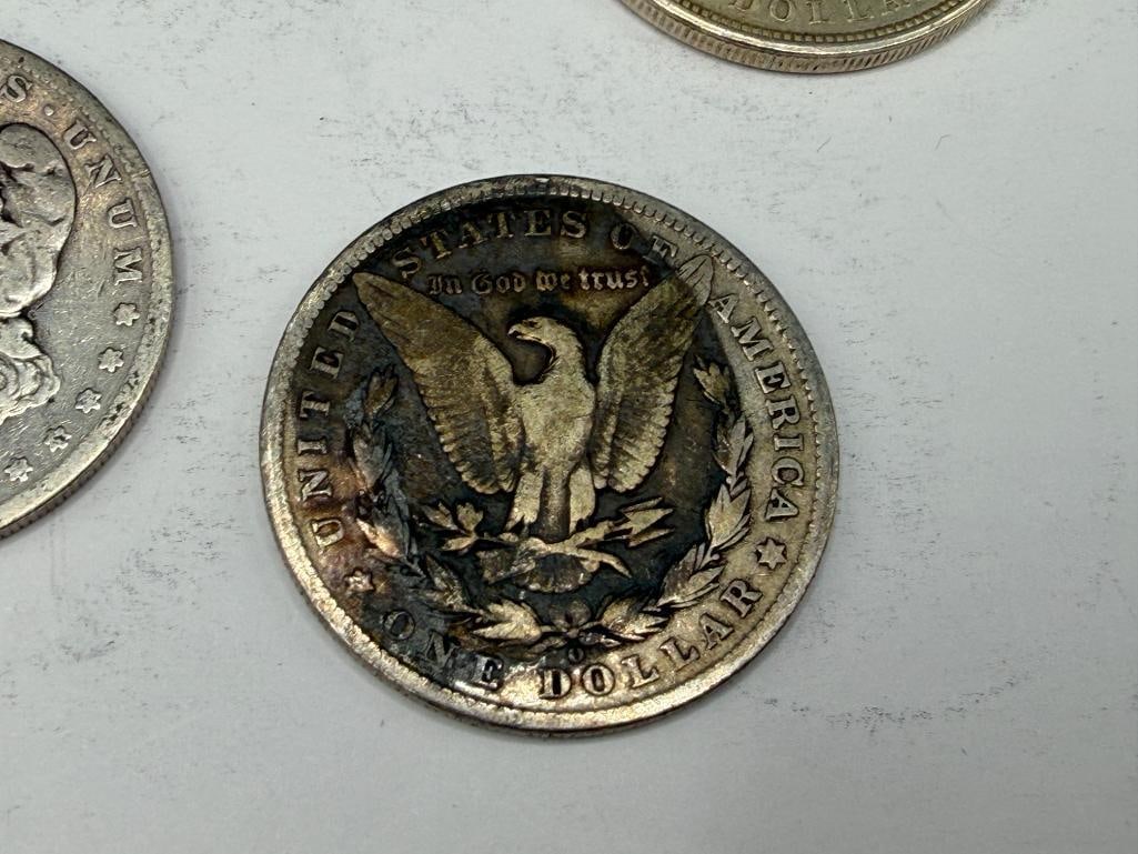 FIVE U.S. MORGAN SILVER DOLLARS - 9