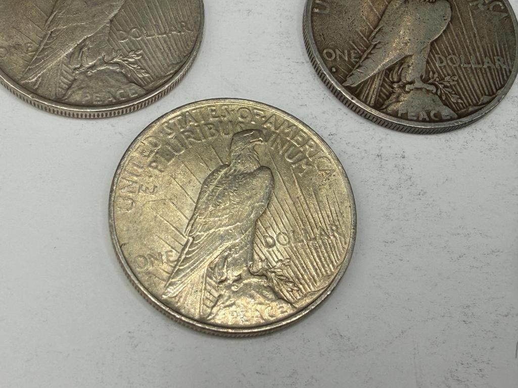 FIVE U.S. PEACE SILVER DOLLARS - 11