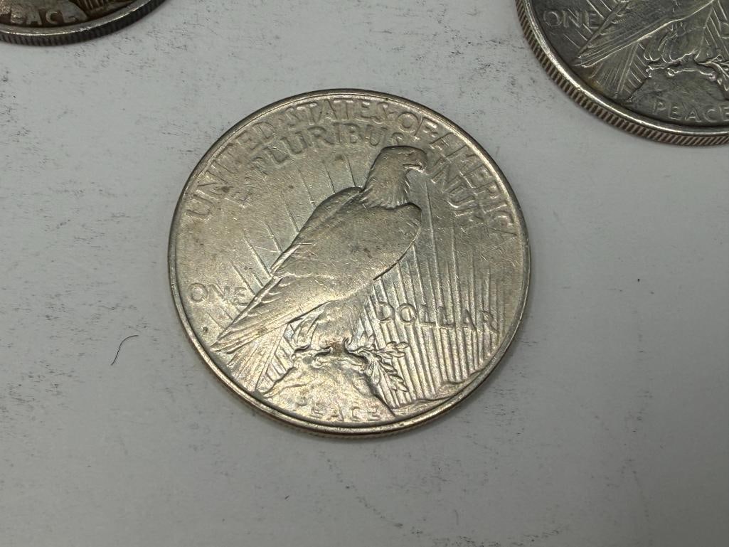 FIVE U.S. PEACE SILVER DOLLARS - 9