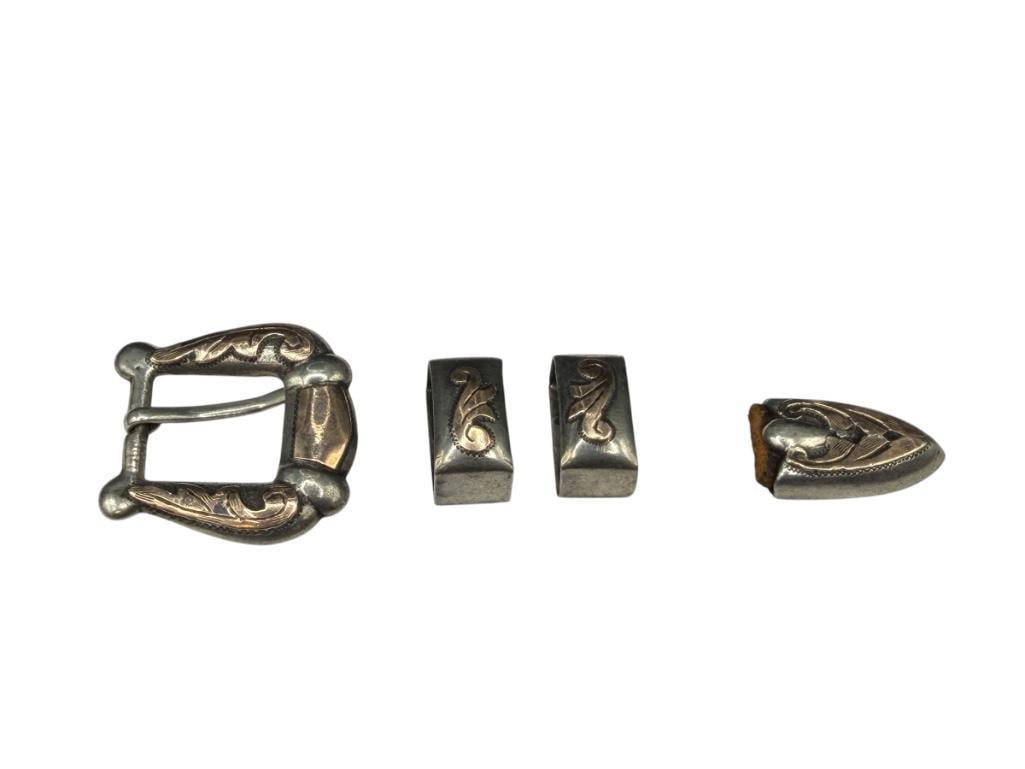 VINTAGE MEXICO MADE STERLING SILVER AND GOLD PLATED WESTERN LADIES / CHILD'S BELT BUCKLE SET: INCLUDES BUCKLE, TWO LOOPS, AND BELT TIP, MARKED ON BELT LOOPS "MADE IN MEXICO" BUCKLE IS 1 1/2", 32.53 GRAMS TOTAL