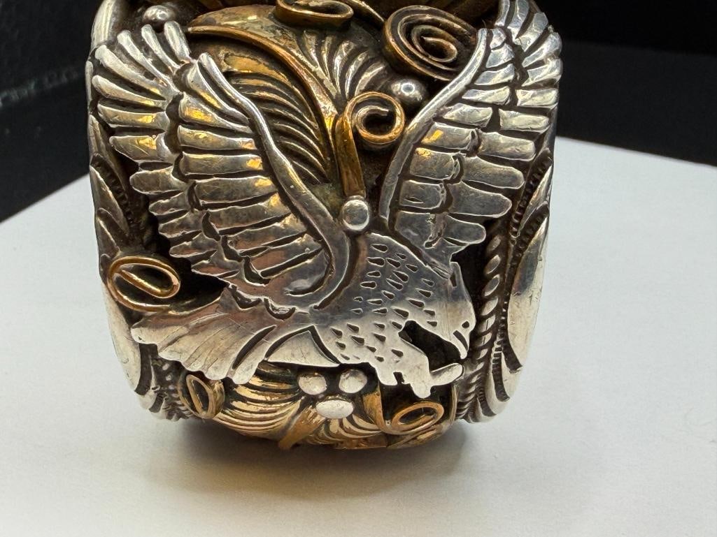 NAVAJO ALLEN CHEE ARTIST SIGNED STERLING SILVER TOOLED SILVER EAGLE, FEATHER, AND SCROLL WATCH CUFF - 7