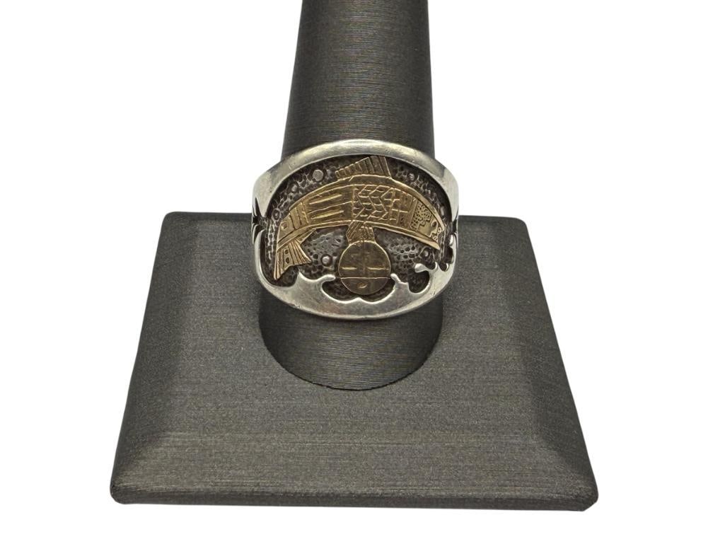 STERLING SILVER AND 14K YELLOW GOLD RODERICK TENORIO ARTIST SIGNED RING: FEATURING FISH FETISH DESIGN, SANTO DOMINGO PUEBLO, SIGNED BY ARTIST SIZE 12 1/2, 3/4" FRONT, 11.11 GRAMS