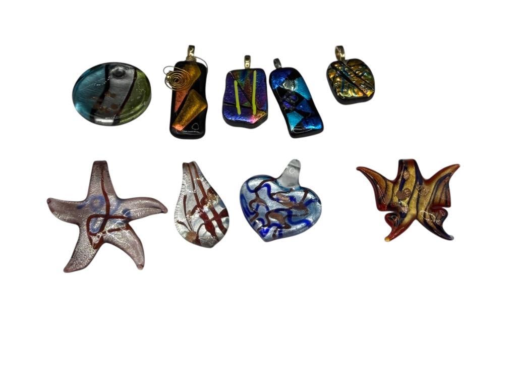 NINE ART GLASS PENDANTS FEATURING VARIOUS DESIGNS AND SHAPES: UP TO 2 3/8"