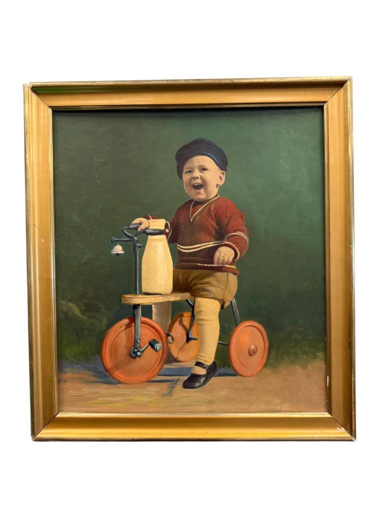 ANTIQUE OIL-PAINTED PHOTOGRAPH CIRCA MID-1800'S TO EARLY 1900'S:  DONE BY APPLYING PIGMENTS OVER FAINT PHOTOGRAPHIC BASE, POPULAR BEFORE COLOR FILM, DEPICTS CHEERFUL YOUNG BOY RIDING A TRICYCLE, FRAMED 19 1/2" X 22 1/2" FRAME