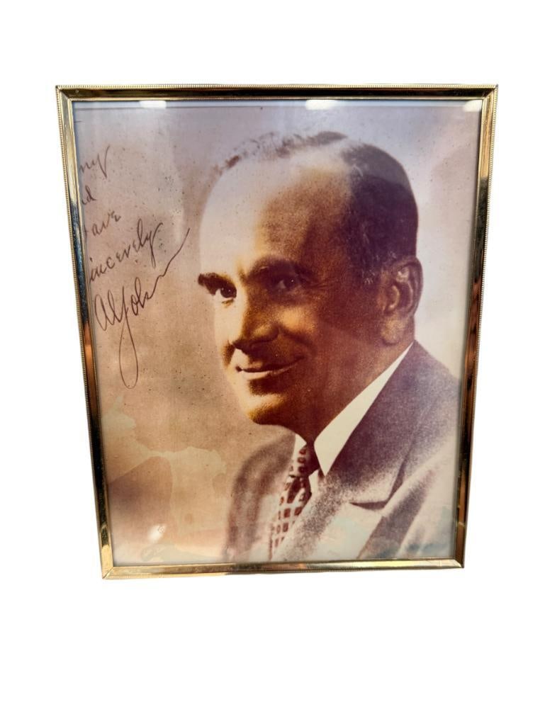 AUTOGRAPHED AL JOLSON PHOTOGRAPH PAST AMERICAN ACTOR, COMEDIAN, AND SINGER: WAS ONCE ONE OF THE HIGHEST PAID ENTERTAINERS BETWEEN 1910 AND 1920, FRAMED 8" X 10" FRAME