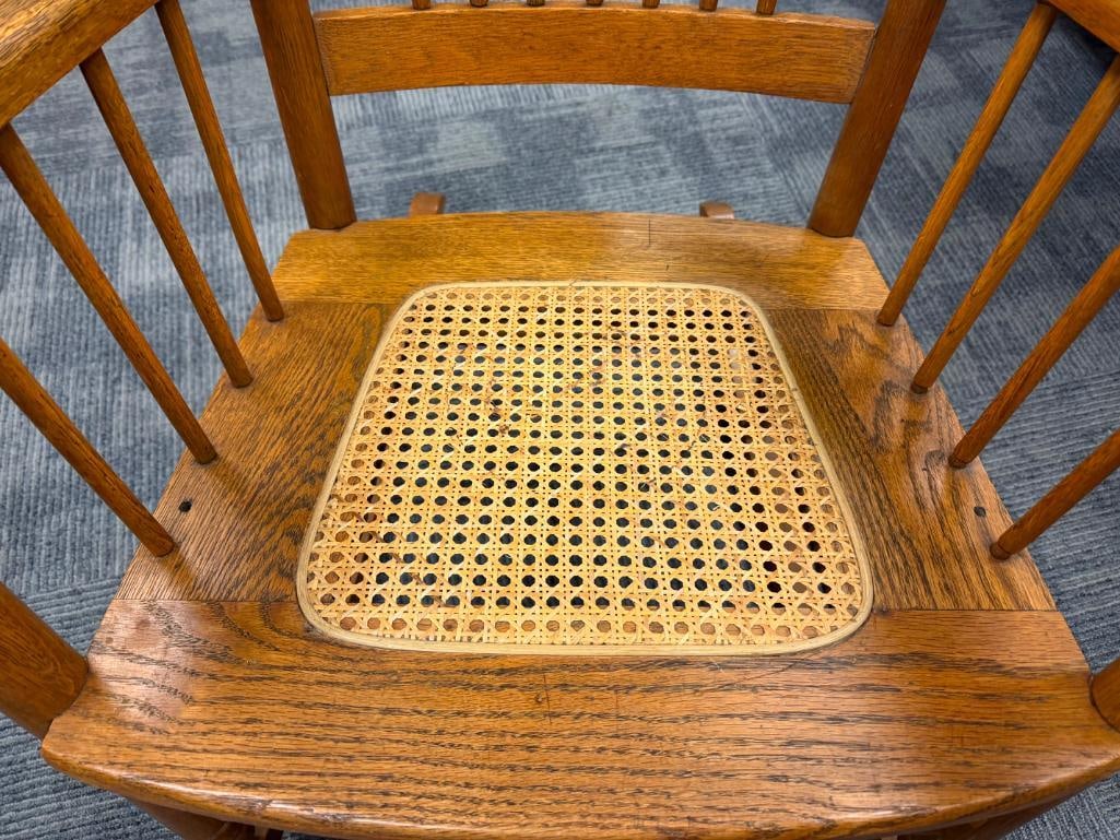 ANTIQUE OAK SPINDLE ROCKING CHAIR WITH PRESSED BACK AND CANE SEAT - 10