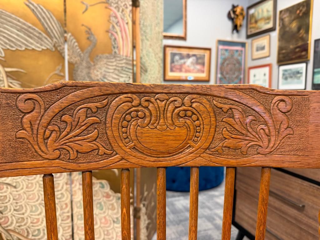 ANTIQUE OAK SPINDLE ROCKING CHAIR WITH PRESSED BACK AND CANE SEAT - 11