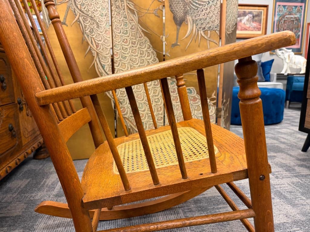 ANTIQUE OAK SPINDLE ROCKING CHAIR WITH PRESSED BACK AND CANE SEAT - 5