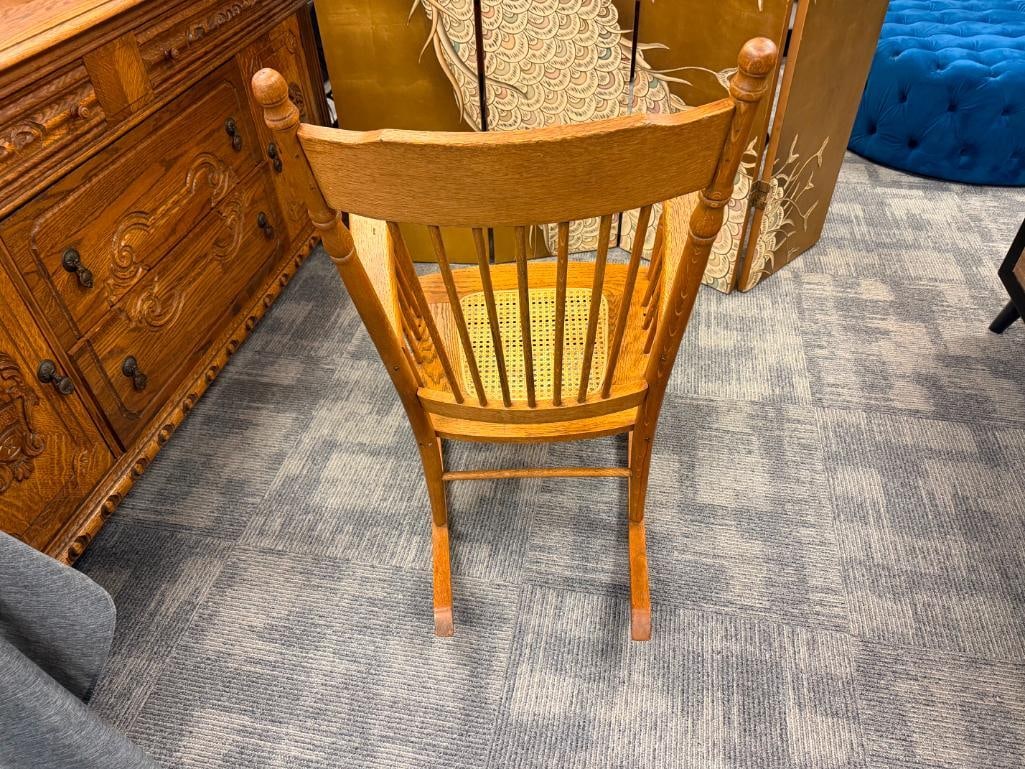 ANTIQUE OAK SPINDLE ROCKING CHAIR WITH PRESSED BACK AND CANE SEAT - 6
