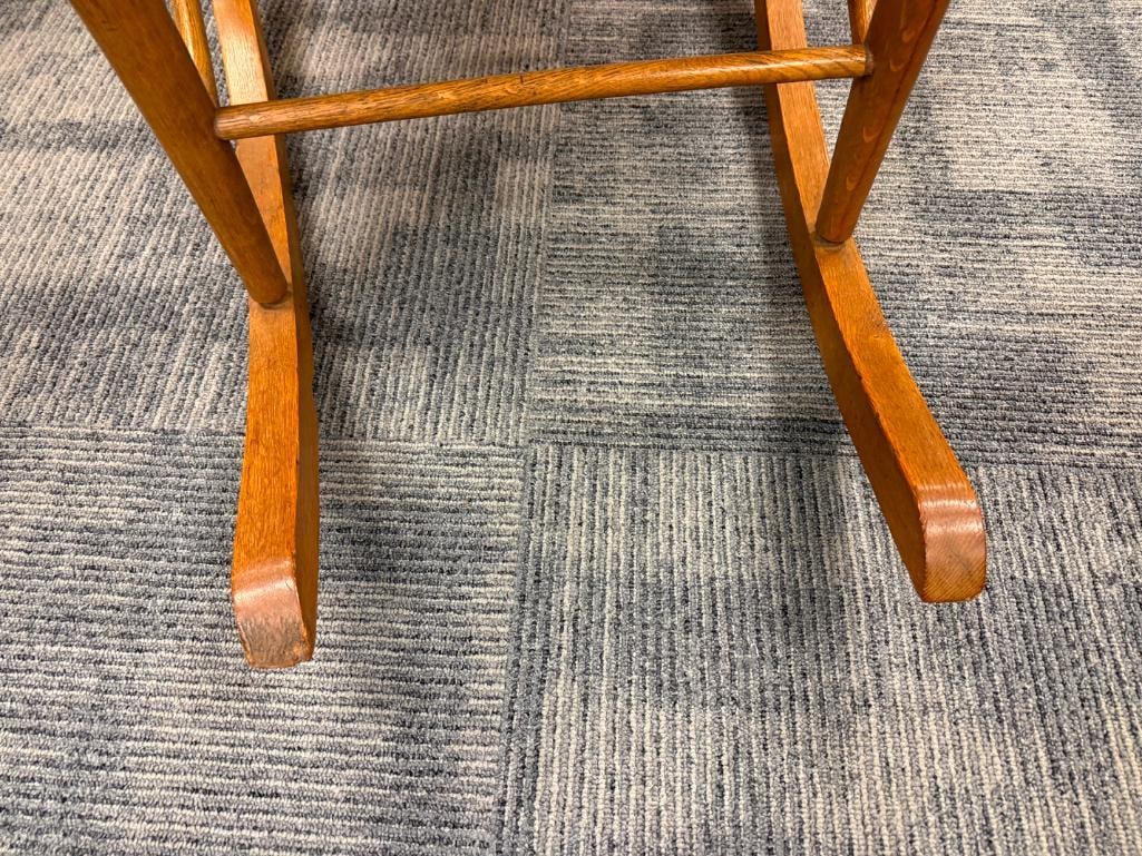 ANTIQUE OAK SPINDLE ROCKING CHAIR WITH PRESSED BACK AND CANE SEAT - 8