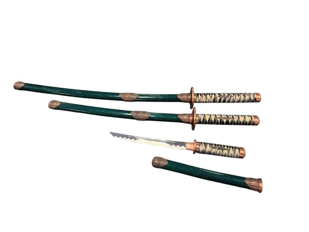 THREE PIECE DECORATIVE KATANA SET FEATURING WRAPPED HANDLES: EACH KATANA INCLUDES SHEATH IN GREEN WITH DECORATIVE COPPER FINISH DECORATION 11", 18", AND 24" BLADE LENGTHS