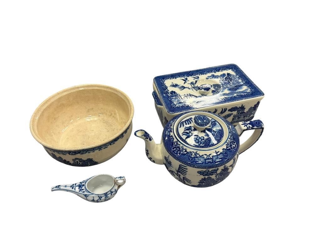 VINTAGE JAPAN BLUE WILLOW CHINA INCLUDES TWO PIECES BY MORIYAMA CIRCA 1920'S - 1940'S: MORIYAMA RECTANGULAR REFRIGERATOR JAR WITH LID AND TEAPOT WITH LID, SERVING BOWL IS MARKED MADE IN JAPAN AND IS MISSING ITS LID, PLUS BLUE AND WHITE PORCELAIN CREAMER 5 3/4" UP TO 11" L