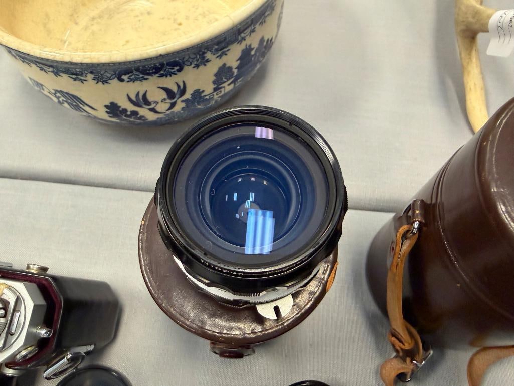 NIKON F 35MM SLR PROFESSIONAL FILM CAMERA INTRODUCED IN 1959 PLUS NIKKOR-H 28MM LENS NO. 631967 - 11