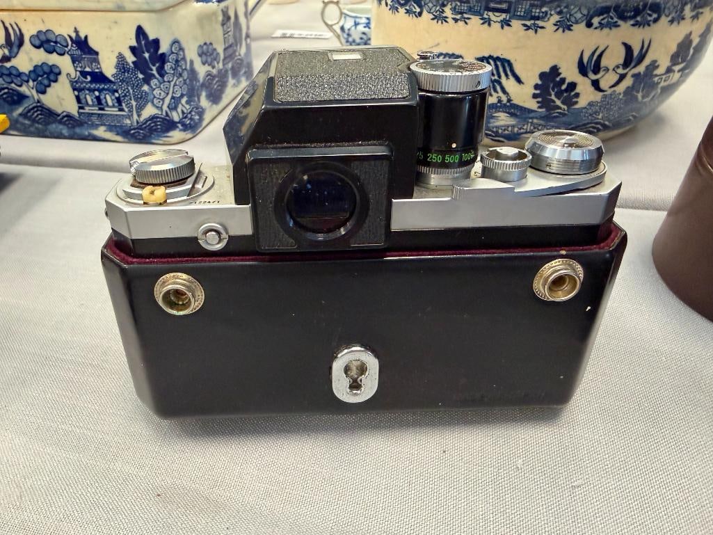NIKON F 35MM SLR PROFESSIONAL FILM CAMERA INTRODUCED IN 1959 PLUS NIKKOR-H 28MM LENS NO. 631967 - 5