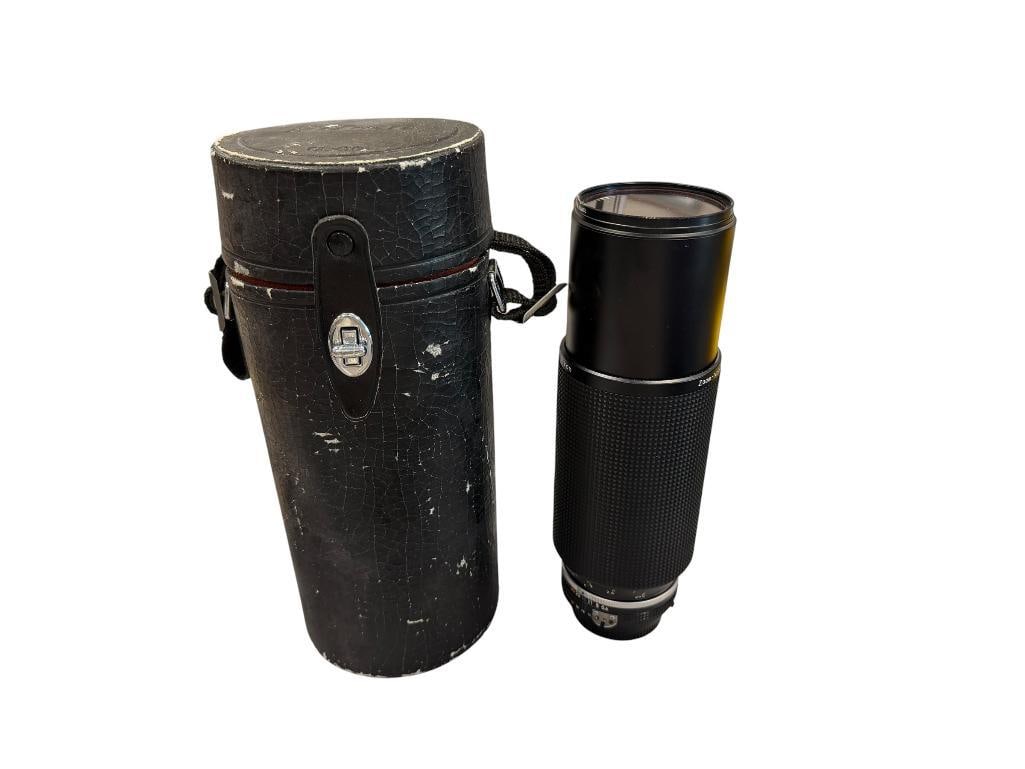 VINTAGE NIKON NIKKOR 100-300MM LENS NO. 208957: INCLUDES NIKKOR LENS TUBE, TUBE IS IN POOR CONDITION 8 3/4 L
