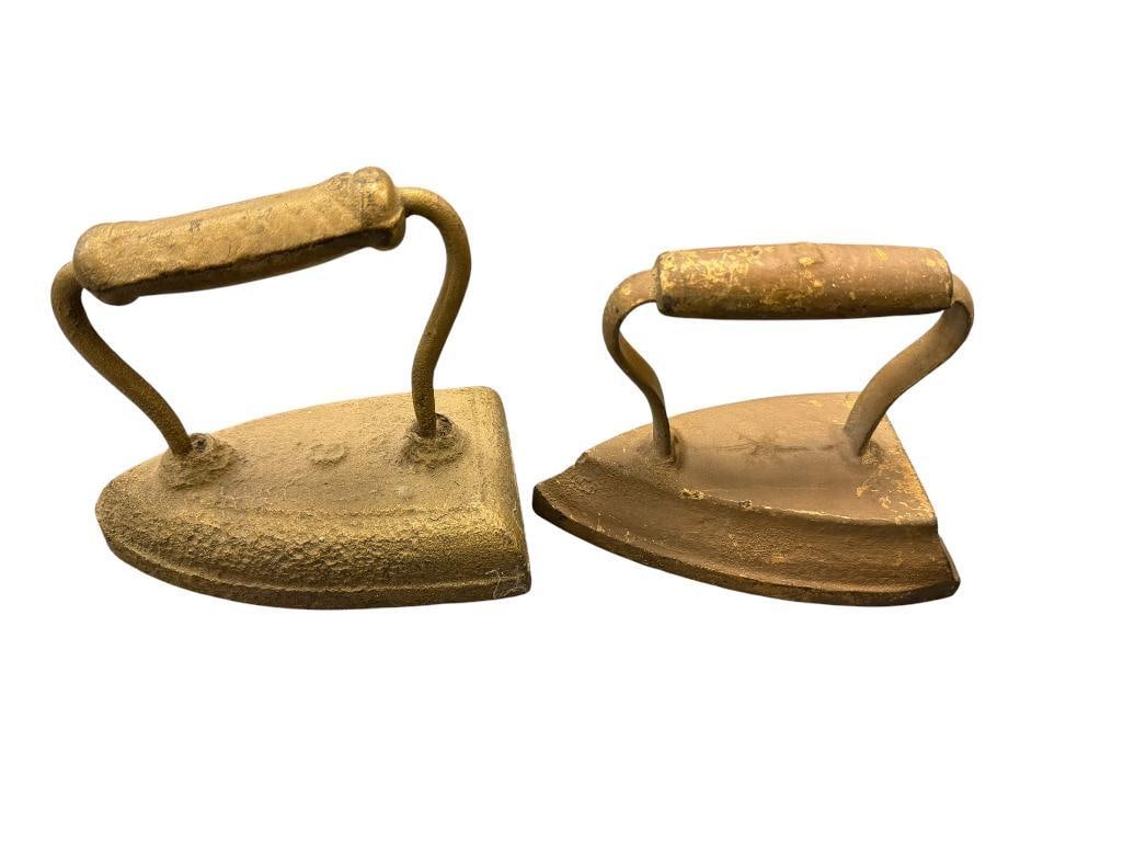 TWO ANTIQUE CAST IRON SAD IRONS: ONE IS MARKED NO. OTHER IS MARKED WITH A STAR 5 3/4" L