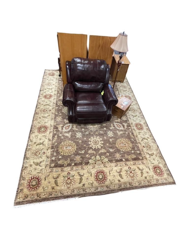 LARGE HAND WOVEN WOOL PILE AREA RUG TRADITIONAL DESIGN IN BROWN TONES: FLORAL DESIGN RUG IN BROWN, GREEN AND RED TONES, WITH SHORT FRINGE, RECENTLY DRY CLEANED, LIGHT WEAR, GOOD COLOR 144" X 106" 
