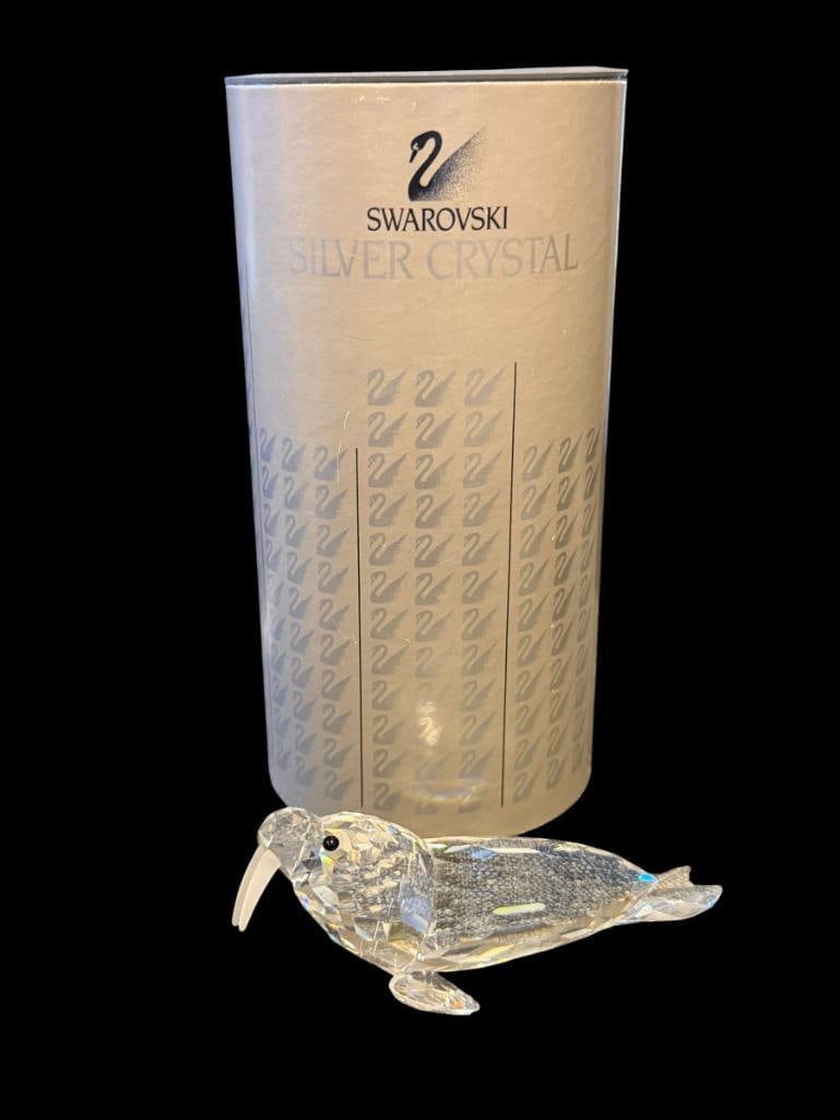 SWAROVSKI CRYSTAL WALRUS DESIGNED BY MICHAEL STAMEY RELEASED IN 1989 KINGDOM OF ICE AND SNOW: FACETED CRYSTAL WALRUS FIGURINE, RETIRED IN 1993, MINT CONDITION, NO DAMAGE OR REPAIRS, INCLUDES ORIGINAL BOX 4" L 