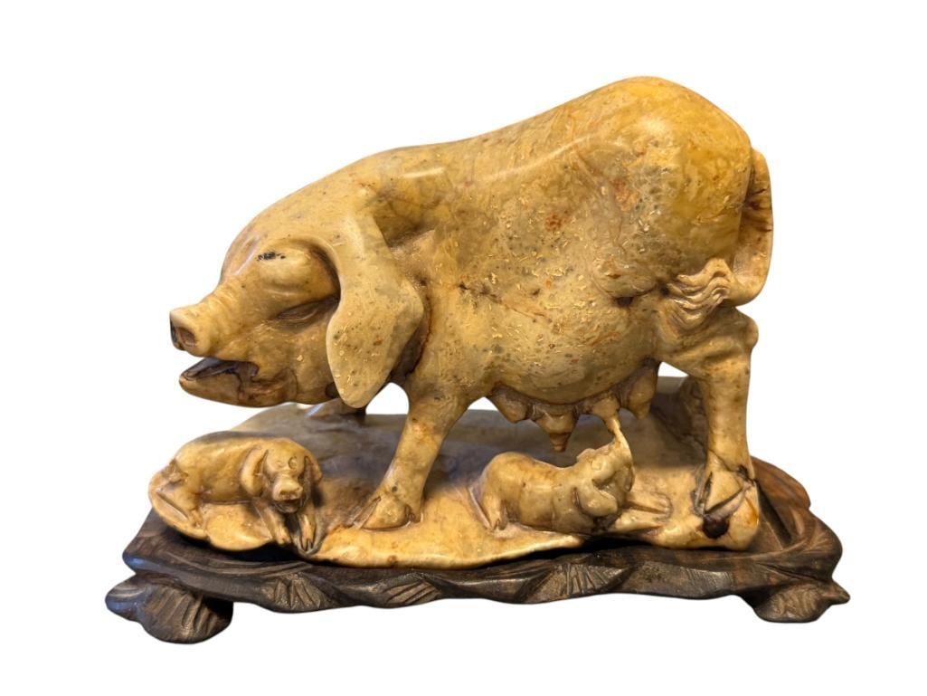 VINTAGE CHINESE CARVED HARDSTONE FIGURE OF A PIG WITH PIGLETS: FEATURES A MOTHER PIG WITH THREE PIGLETS, INCLUDES CARVED WOOD BASE 3 3/4" H, 5 1/4" L