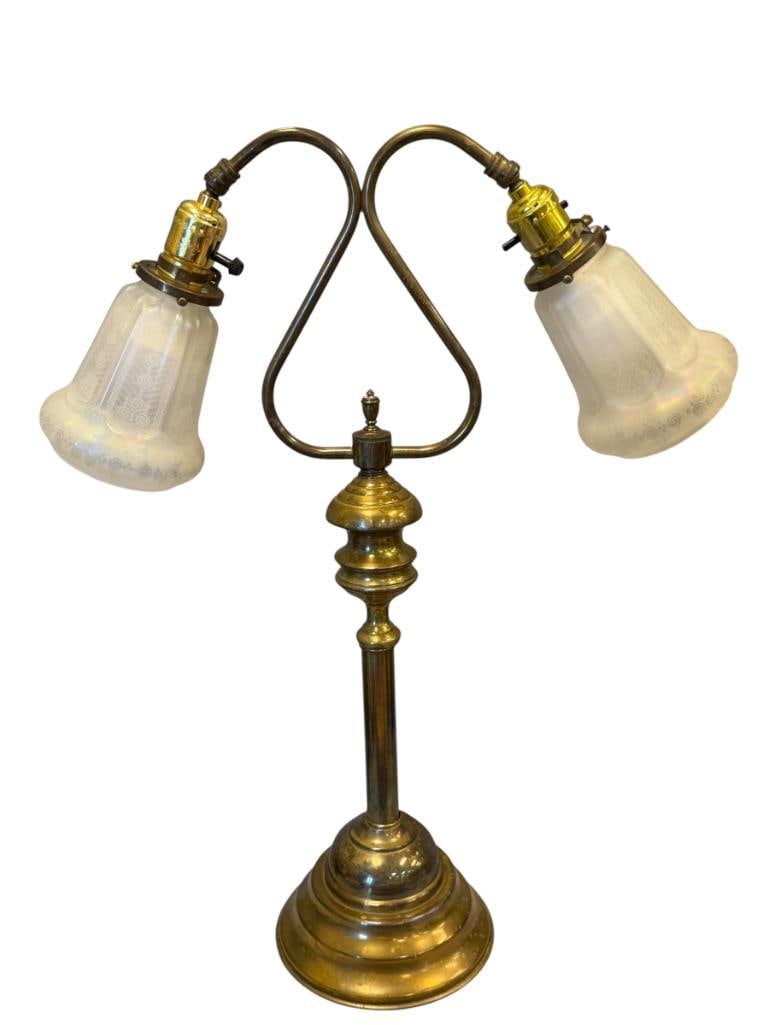 ART NOUVEAU STYLE BRASS DOUBLE-ARM TABLE LAMP WITH ACID ETCHED IRIDESCENT SHADES MADE IN GERMANY: ROUND STEPPED BASE WITH CAST IRON WEIGHT, S-SHAPED NECK, INCLUDES ACID ETCHED IRIDESCENT LAMP SHADES MARKED GERMANY, NO CHIPS OR CRACKS TO SHADES, TESTED + 24" H