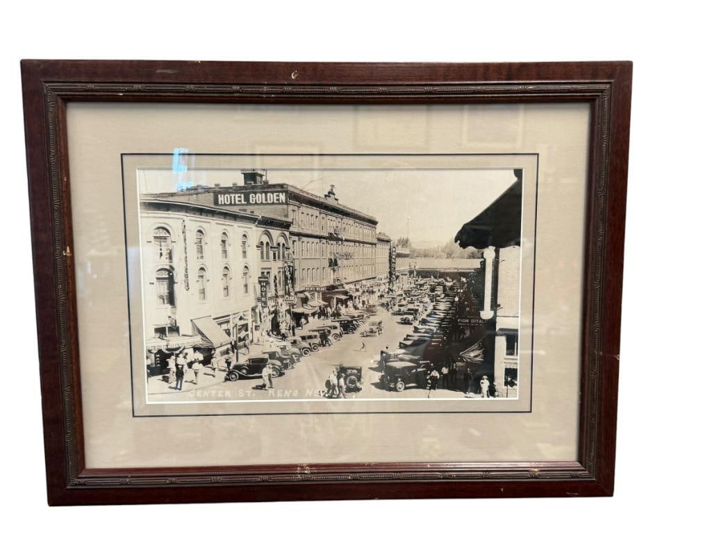 CIRCA 1930'S PHOTO-PRINT OF CENTER ST. IN DOWNTOWN RENO, NV FEATURES BANK CLUB, HOTEL GOLDEN: PHOTO DEPICTS BUSTLING CARS AND PEOPLE ON CENTER ST IN BLACK AND WHITE, FRAMED 21" X 15 1/2" FRAME