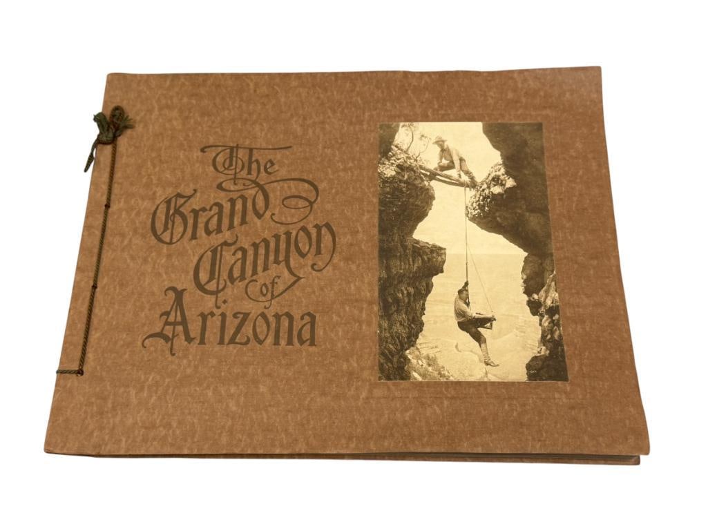 1913 THE GRAND CANYON BOOK FEATURES 18 TIPPED-IN HAND COLORED PHOTOGRAPHS PUBLISHED KOLB BROTHERS: ANTIQUE PHOTO BOOK WITH SCENES OF THE GRAND CANYON OF ARIZONA PUBLISHED BY THE KOLB BROTHERS IN 1913, COMPLETE BOOK, OVERALL IN GOOD CONDITION, SOME WEAR ALONG THE EDGES, SMALL TEAR ON THE BACK COVER